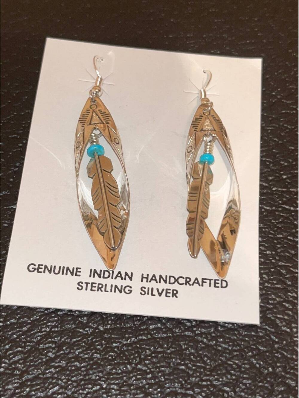 Navajo handmade sterling silver turquoise earrings feather